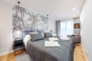 Postel nebo postele na pokoji v ubytování Apartament Perłowe Fale