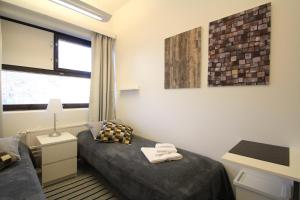 Posezení v ubytování Forenom Hostel Helsinki Pitäjänmäki