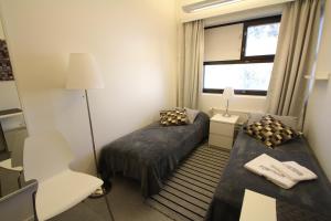 Postel nebo postele na pokoji v ubytování Forenom Hostel Helsinki Pitäjänmäki