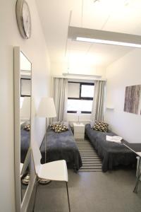 Postel nebo postele na pokoji v ubytování Forenom Hostel Helsinki Pitäjänmäki