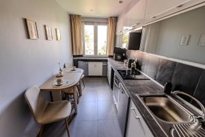 Kuchyň nebo kuchyňský kout v ubytování Makówka na Krupówkach by Meadow Stay Apartments + 20 fotografií