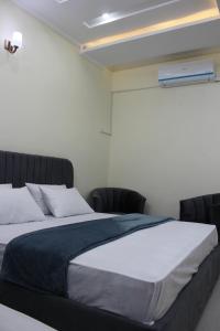 Photo de la galerie de l'établissement Islamabad Elite Suites, à Islamabad 8 autres photos