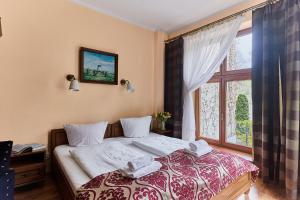 Kamienica pod Kasztanami Świnoujście (Usedom Insel)客房内的一张或多张床位