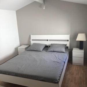 Postel nebo postele na pokoji v ubytování Maison avec plage à pied