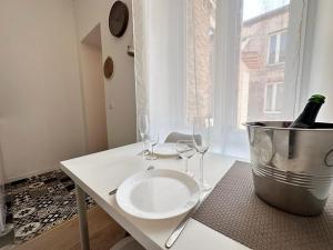 Fotografie z fotogalerie ubytování Chavalliaud 4 studio tout mignon proche centre v Remeši + 11 fotografií