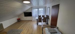 TV a/nebo společenská místnost v ubytování Wohnung Zentral Crailsheim