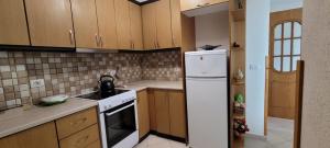 Η κουζίνα ή μικρή κουζίνα στο Fred's Apartment