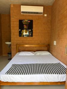 Time Travellers Hostel客房内的一张或多张床位