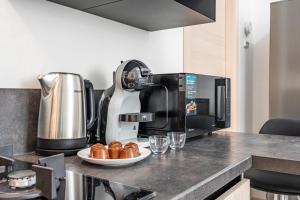 Kuchyň nebo kuchyňský kout v ubytování Cascina Fedeli - Stazione e Centro