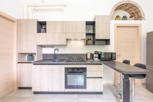 Kuchyň nebo kuchyňský kout v ubytování Cascina Fedeli - Stazione e Centro