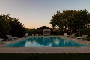 The swimming pool at or close to Masseria Lacatena