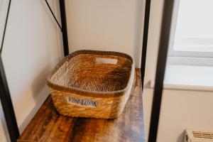a wicker basket sitting on top of a table at 4 Clovelly Court, Derby, DE22 1GS in Derby