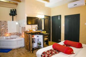 Ein Bett oder Betten in einem Zimmer der Unterkunft Hotel Tourist Residency