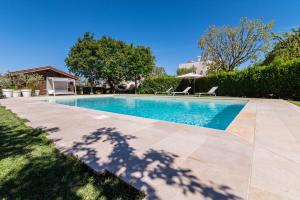 The swimming pool at or close to Masseria Lacatena