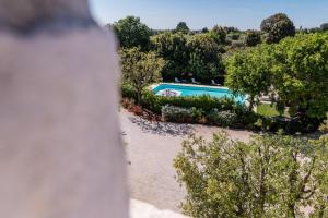 The swimming pool at or close to Masseria Lacatena
