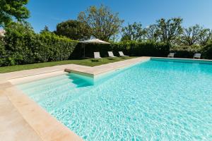 The swimming pool at or close to Masseria Lacatena