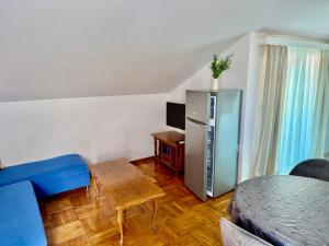 TV a/nebo společenská místnost v ubytování Apartments Sirena Korčula