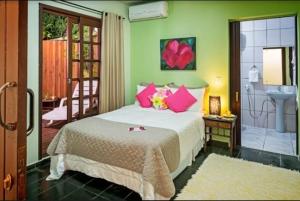 Cama ou camas em um quarto em Pousada e Restaurante Fim da Trilha
