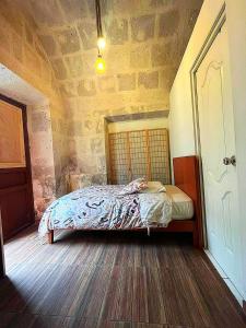 Cama o camas de una habitación en Bubamara San Lazaro