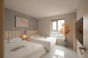 Ένα ή περισσότερα κρεβάτια σε δωμάτιο στο Apartment Terra Royal, 280 Nam Kỳ Khởi Nghĩa, Quận 3, thành phố Hồ Chí Minh