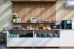 a counter with plates and food on it at Villa Sarmassa in Narzole
