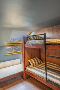 A bed or beds in a room at Otter Hostel Connemara