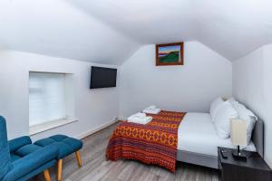 En eller flere senge i et værelse på Glastonbury-FreeParking-ContactlessCheckIn-Sleeps2