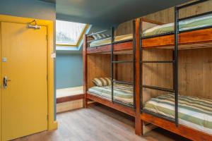 A bed or beds in a room at Otter Hostel Connemara