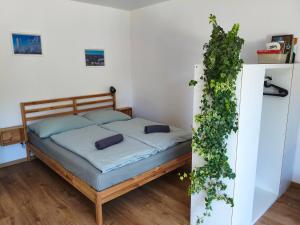 Posteľ alebo postele v izbe v ubytovaní Apartmán Matylda