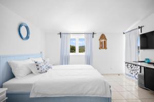 Letto o letti in una camera di Boutique Guesthouse Sveti Petar, on the beach, heated pool & boat berth - ADULT ONLY