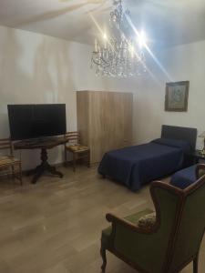 TV a/nebo společenská místnost v ubytování Antonelli Guest House