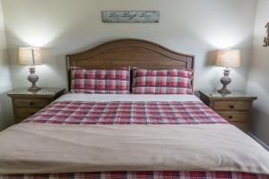 Ένα ή περισσότερα κρεβάτια σε δωμάτιο στο Braircliff Condo