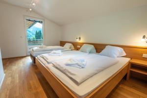 Postel nebo postele na pokoji v ubytování Appartements MaLo by we rent