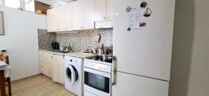 Køkken eller tekøkken på Vangelos apartment