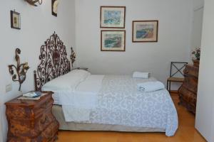 Postel nebo postele na pokoji v ubytování Villa Casa Rosada + 24 fotografií