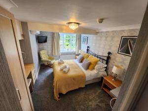 Ένα ή περισσότερα κρεβάτια σε δωμάτιο στο OYO Lavender House Hotel