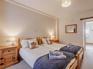 Ένα ή περισσότερα κρεβάτια σε δωμάτιο στο 2 bed in Holsworthy 91755