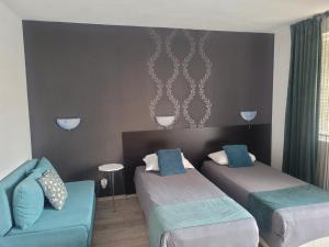 Postel nebo postele na pokoji v ubytování Guest House Taligarov
