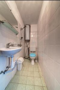 a bathroom with a sink and a toilet at Funny-Gunny Room to The Sea Garden in Burgas City