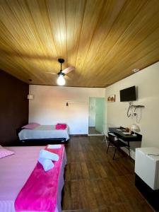 Postel nebo postele na pokoji v ubytování Conexão natureza