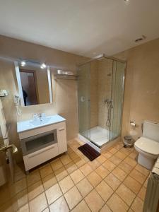 Koupelna v ubytování Hotel Guara Inlukā