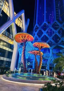 a fountain with three mushrooms in front of a building at LAD Apartment & Homestay Hai Phong - Doji Diamond Crown Le Hong Phong in Ðông Khê +27 photos