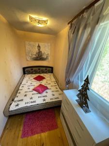 Postel nebo postele na pokoji v ubytování Csipke Apartman