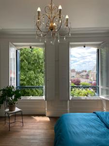 Voodi või voodid majutusasutuse Suite privative avec Balcon, Domaine des Étoiles toas