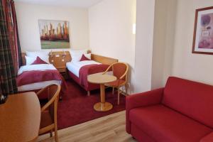 Postel nebo postele na pokoji v ubytování Garner Hotel Hamburg - Wandsbek Marktplatz by IHG