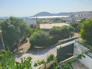 a view from the balcony of a house at Bay view in Salamina