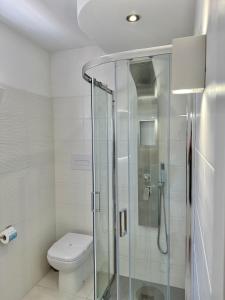 Koupelna v ubytování Hotel Sirena - Servizio spiaggia inclusive