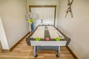 a ping pong table in a room with at 128 Capitan Circle ("Basecamp") in Pagosa Springs