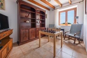 Telewizja i/lub zestaw kina domowego w obiekcie Finca Son Ramon Llull