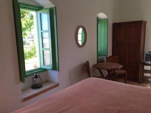 Postel nebo postele na pokoji v ubytování Villa Lemonia - Guest House